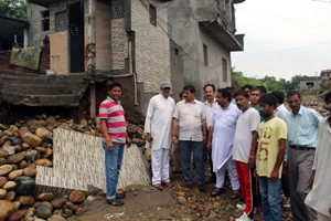 MP Jugal Kishore Sharma during his visit to flood hit areas of Jammu on Thursday. 