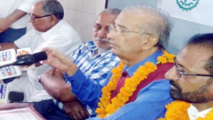 Randhir Singh interacting with media persons at Jammu on Thursday. 