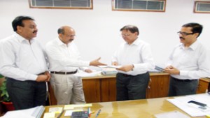 R.N Srivastava, Executive Director (HR), AAI and A Bharadwaj, Director, CIDC signing Memorandum of Agreement (MOA) in the presence of other AAI and CIDC officials.