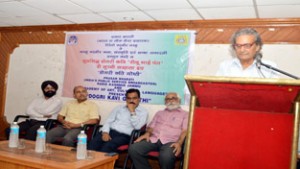 Dignitary expressing his views during Dogri Mushaira at KL Saigal Hall on Friday.