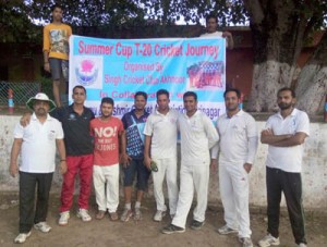 Players of Challenger Cricket Club posing for a photograph after their victory against KCC at Akhnoor.