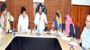 Deputy Commissionier Jammu Simrandeep Singh chairing a meeting on Friday. 
