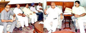 BJP national vice president Avinash Rai Khanna and Party State president Jugal Kishore Sharma in a meeting at Jammu on Wednesday.