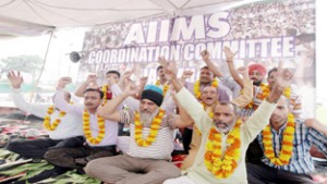 Members of AIIMS CC protesting at Jammu on Wednesday. -Excelsior/Rakesh