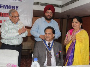 Ashok Gupta being installed as President of Rotary Club Jammu Tawi. —Excelsior/Rakesh