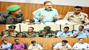 Divisional Commissioner, Dr Pawan Kotwal chairing a meeting at Jammu on Wednesday.