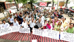 CPI(M) workers raising slogans during protest at Jammu on Monday.-Excelsior/ Rakesh