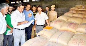 Minister for CAPD, Chowdhary Zulfkar Ali during surprise visit to CAPD godown at Srinagar on Sunday. 
