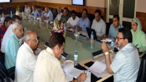 Minister for Floriculture Syed Mohammad Altaf Bukhari chairing a meeting at Srinagar on Saturday.