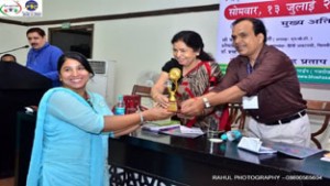 Jammu based girl, Kamini Gupta being felicitated by MP Dr Udit Raj.