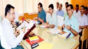 Minister for CAPD, Ch Zulfkar Ali chairing a meeting at Srinagar on Tuesday.