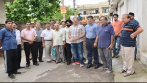 Speaker Kavinder Gupta kick starting developmental works in Gandhi Nagar on Monday. 