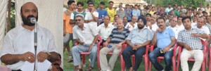 Minister for Forest, Bali Bhagat addressing public meeting at Purkhoo on Tuesday.