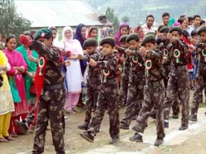 Students attired in Army dress presenting march-past on Independence Day.