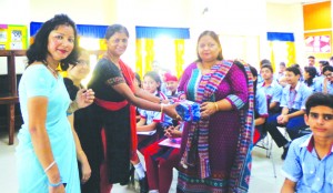 Dr Rashmi Sharma, MD Menace from Govt College, Gandhi Nagar being presented memento during her visit to GD Goenka Public School in Jammu.