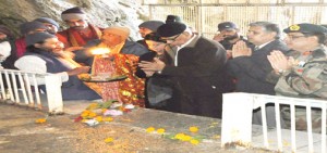 Governor N N Vohra paying obeisance to holy mace on its arrival at cave shrine of Shri Amarnath Ji on Saturday.