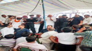 NC president Dr Farooq Abdullah at dharna venue of AIIMS CC at Tawi bridge on Monday.