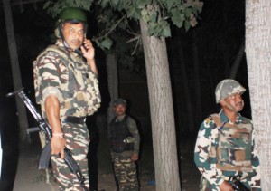 Troops in action during encounter at Pulwama on Monday.— Excelsior/Younis Khaliq