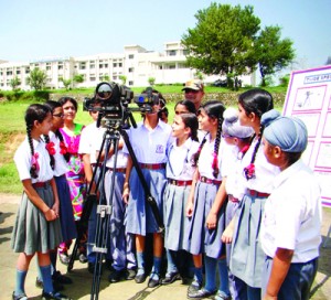 Children during vivid glimpse of military equipment organized by Crossed Swords Division at Akhnoor in Jammu.
