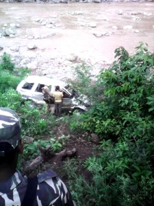 CRPF officials evicting injured persons from a Tavera car, which fell down into a deep gorge at Udhampur.