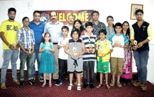 Winners of 'Sur Tarang' posing along with dignitaries in Jammu on Monday.
