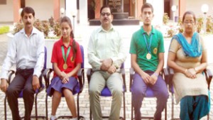 Judokas of MHAC Nagbani School posing alongwith Principal and other dignitaries on Thursday.