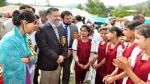 Minister for Sports, Imran Raza Ansari interacting with players during the concluding ceremony of Inter-District Kho-Kho Tournament at Baramulla on Monday.