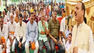 Minister for Rural Development, Abdul Haq Khan addressing public gathering at Akhnoor on Friday.