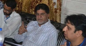 Minister for Transport Abdul Ghani Kohli chairing a meeting at Rajouri.