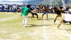 Players in action during a Kabaddi match at BHSS in Bhaderwah on Thursday.