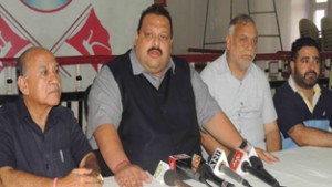 NC’s provincial president Devender Rana addressing press conference in Jammu on Friday. — Excelsior/Rakesh