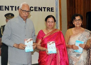 Governor releasing Meera Khanna's book at SKICC.