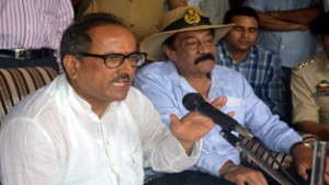 Deputy Chief Minister, Dr Nirmal Singh addressing public grievances redressal camp at Rajkot on Sunday.