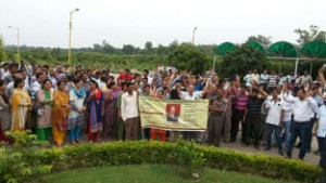 Non-teaching employees of SKUAST-Jammu holding protest demonstration on Friday.