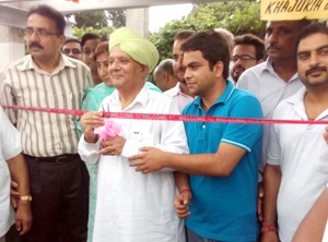 MLC Ashok Khajuria inaugurating electric transformer at Jain Colony on Sunday. 
