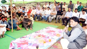 Minister for Transport, Abdul Ghani Kohli addressing a meeting at Panchayat Brevi, Kalakote on Thursday.