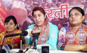 BJP Mahila Morcha president Purnima Sharma at a press conference at Jammu on Wednesday.