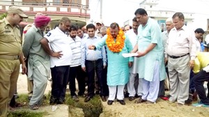 Minister of Industries & Commerce CP Ganga kick starting developmental works in Vijaypur on Friday. -Excelsior/Gautam