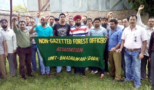 Forest employees staging protest demonstration outside DFO's office at Bhaderwah.