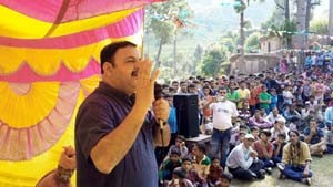 MLA Reasi addressing people on conclusion of Sujandhar Mela on Sunday.