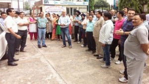 Insurance employees raising slogans during protest at Jammu on Wednesday.