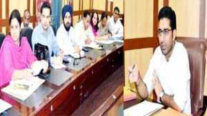 Deputy Commissioner, Dr Shahid Iqbal  Choudhary chairing a meeting at Udhampur on Monday. 