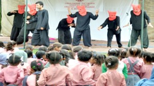 A scene from the play ‘Iss Gran Gi Swarg Banai Lo’ staged on concluding day of Natrang show series in Poonch district.