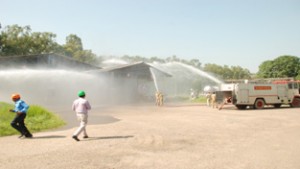 Fire fighters conducting mock drill at LPG Plant on Friday.