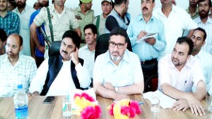R&B Minister Altaf Bukhari chairing a meeting at Poonch on Thursday.