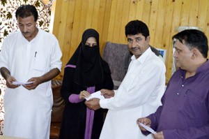 BJP launching Pradhan Mantri Suraksha Bima Yojana in Baramulla. -Excelsior/Aabid Nabi