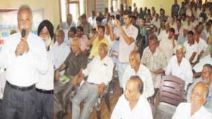 MLA Chhamb, Dr Bhagat speaking during an awareness camp at Khour on Thursday.