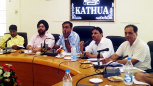 DDC, Ramesh Kumar chairing a meeting at Kathua on Monday.