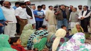 NC leaders visiting the residence of Sarpanch, who was killed in the shelling.