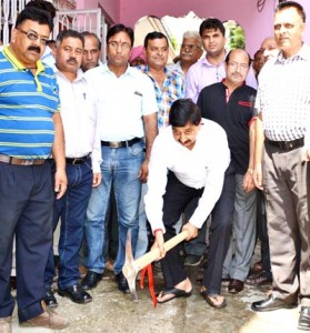 Minister of State for Finance, Pawan Kumar Gupta kick starting construction work at Udhampur on Tuesday.